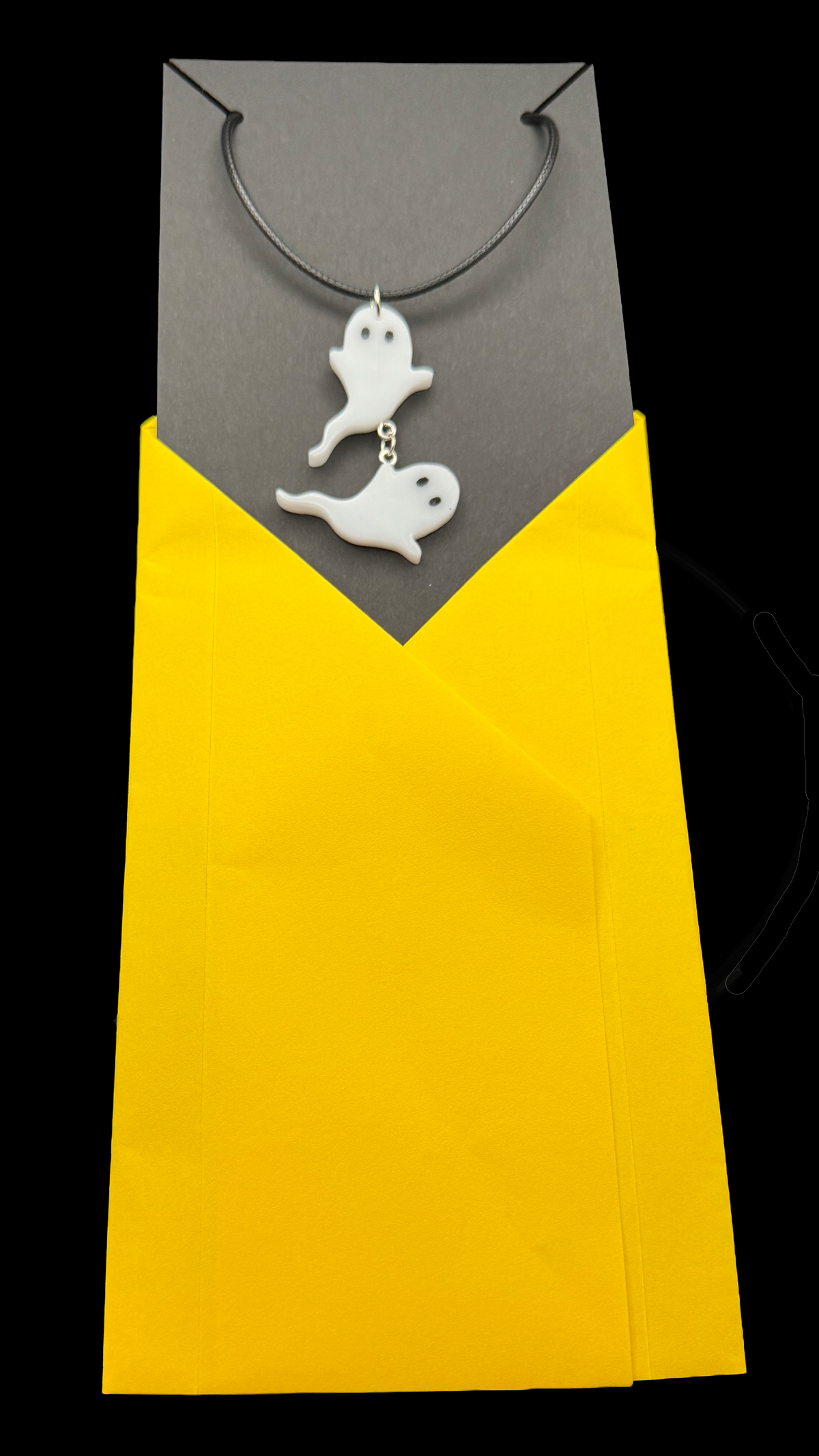 Resin Charms Necklace- Playful Ghosts Dangle from a Waxed Black Leather Cord that will lengthen up to 24"