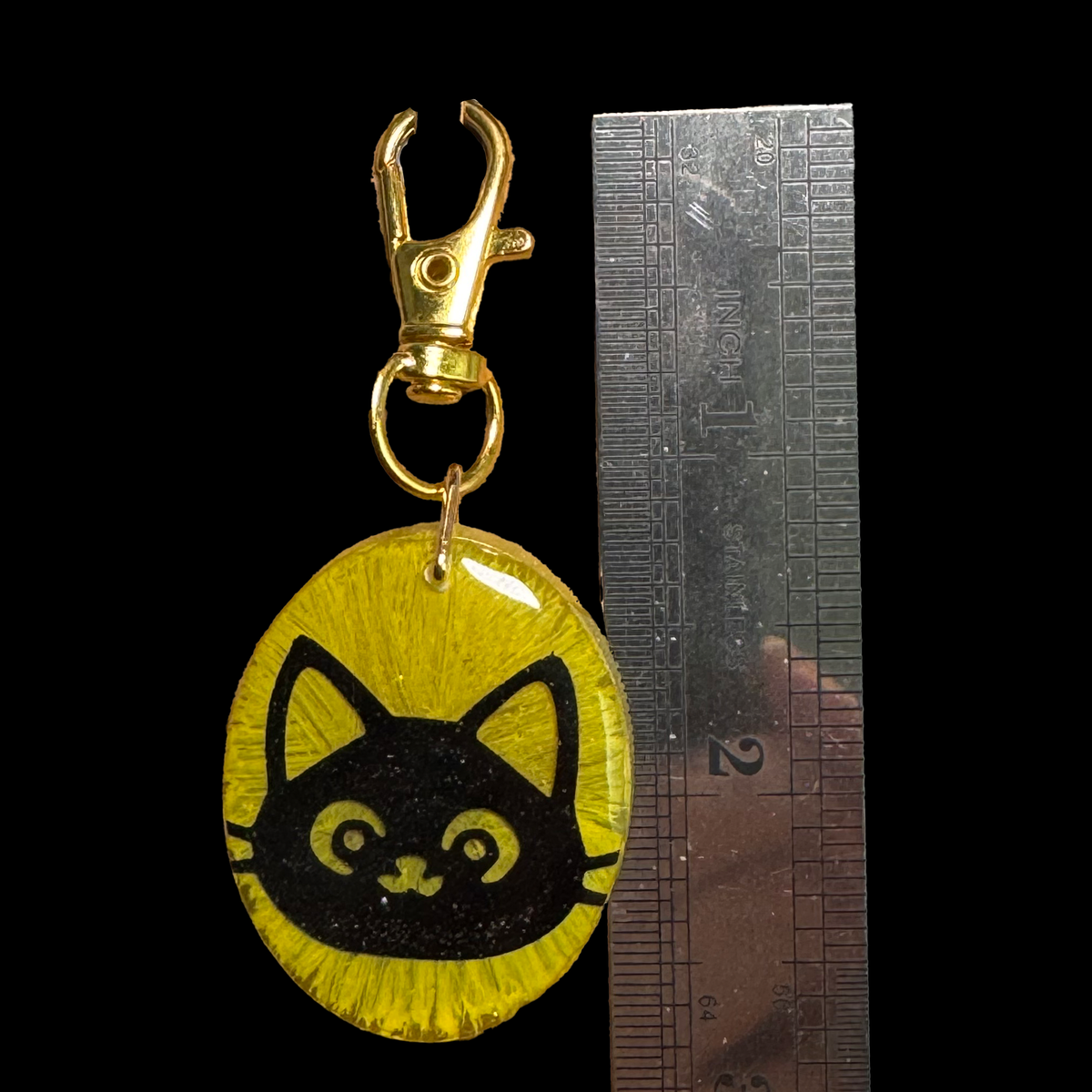 Resin Charm - Black Cat Suspended in Resin with Glitter and Glow-in-the-dark Crystals