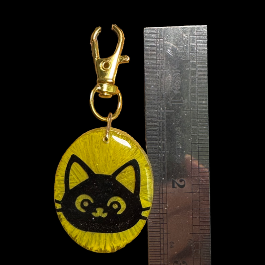 Resin Charm - Black Cat Suspended in Resin with Glitter and Glow-in-the-dark Crystals